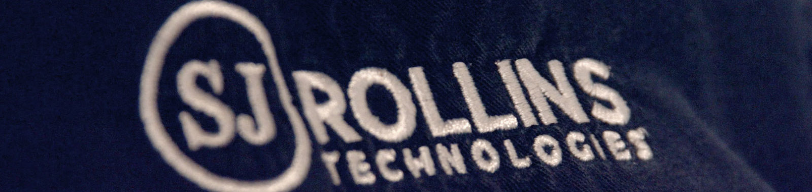 sj rollins technologies logo on shirt